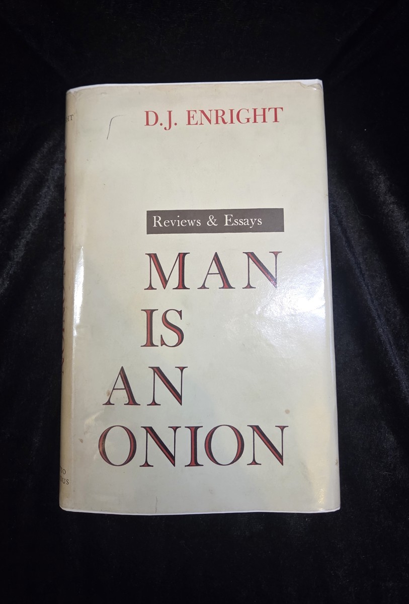 Man is an Onion: Reviews & Essays [Association Copy]