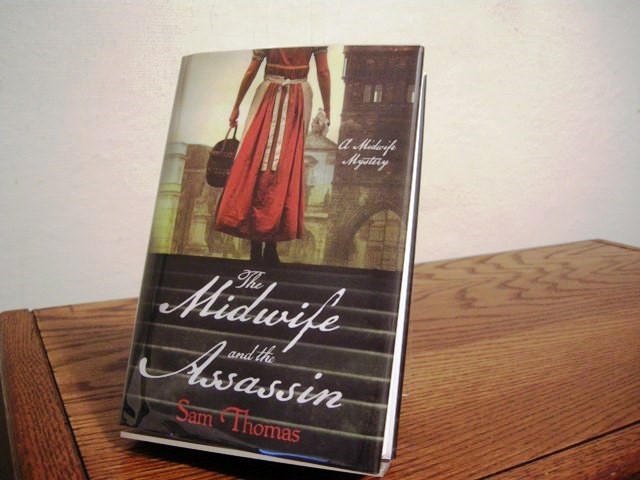 The Midwife and the Assassin