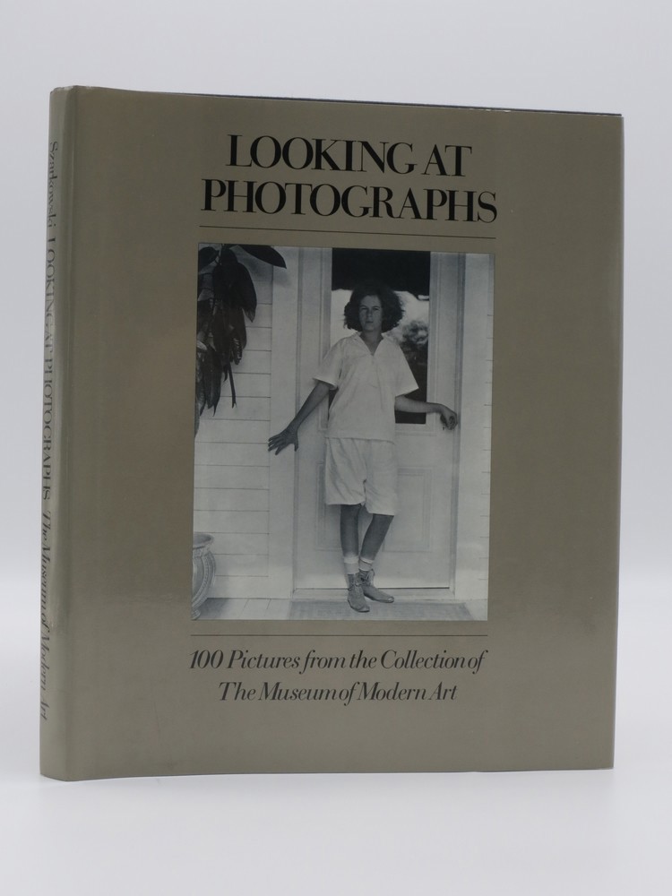 LOOKING AT PHOTOGRAPHS; ; 100 pictures from the collection of the Museum of Modern Art,