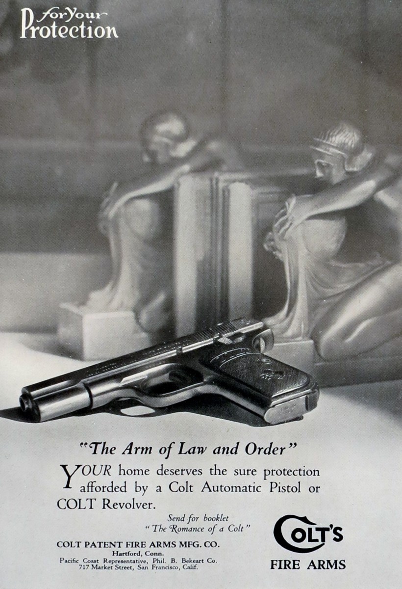 1920S COLT'S FIRE ARMS - ARM OF LAW & ORDER W/ ART DECO BOOKENDS AD