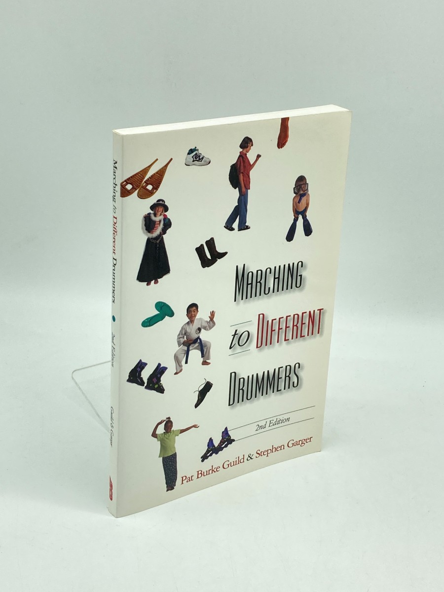 Marching to Different Drummers (Signed)