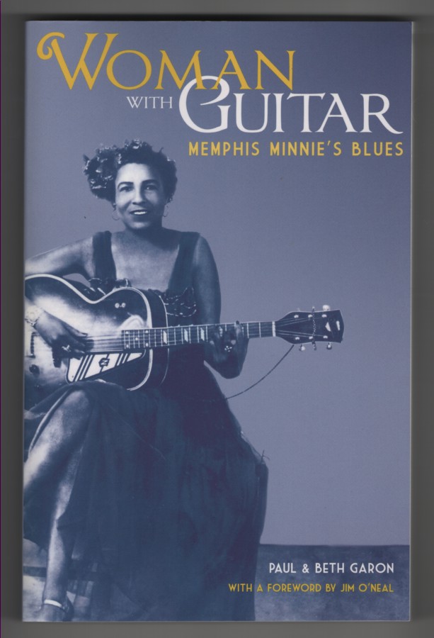 Woman With Guitar. Memphis Minnie's Blues