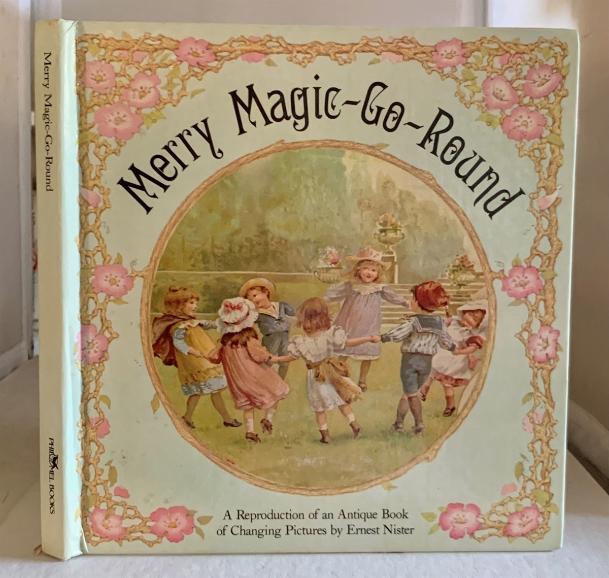 NISTER, ERNEST - Merry Magic-Go-Round a Reproduction of an Antique Book of Changing Pictures