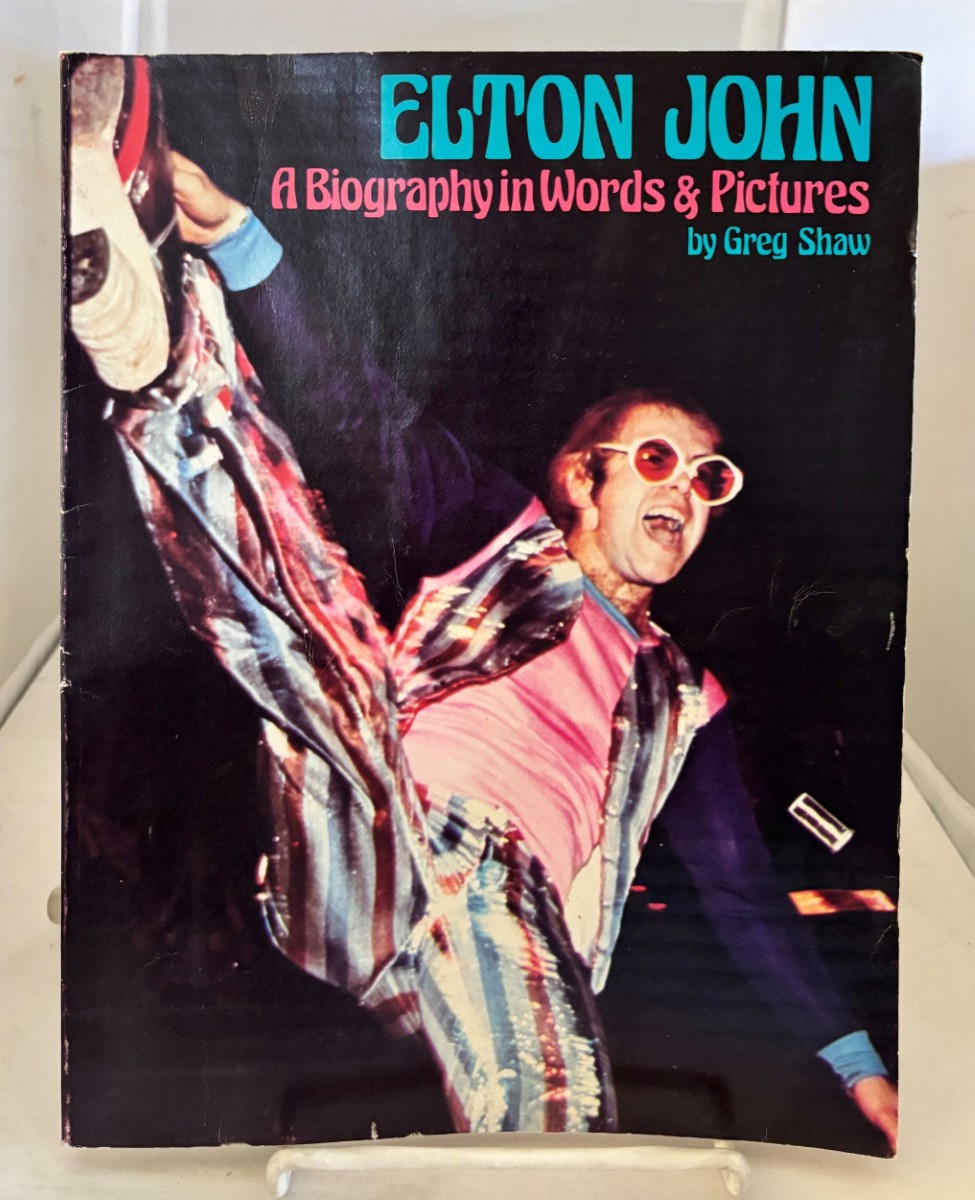 Elton John; A Biography in Words & Pictures