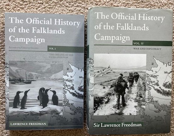 The Official History of the Falklands Campaign (mixed 2-volume set); V1: The Origins of the Falklands War (softcover); and V2: WAr and Diplomacy (hardcover)